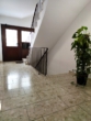 Der Hausflur im Erdgeschoss - Modernisierte 3-Zimmer-Terrassenwohnung mit neuer Einrichtung & großer Süd-/West-Terrasse