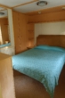 Das Schlafzimmer - Gemütliches Ferienhaus/ Mobilheim mit Grundstück im Harz/ Silberhütte zu verkaufen