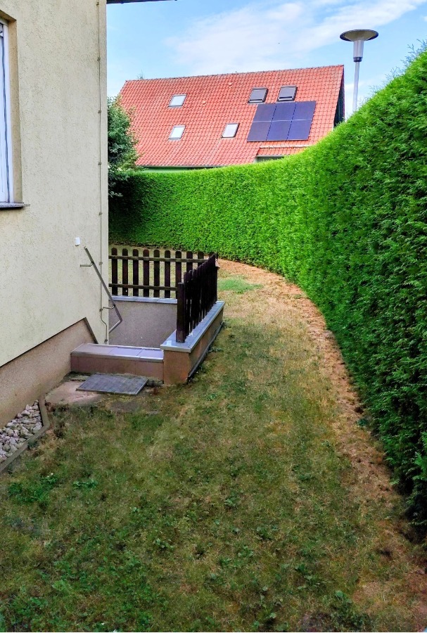 Durchgang zum hinteren Grundstück
