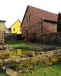 Der Garten mit Teich und Sitzecke - Charmantes Einfamilienhaus mit Nebengelass * in idyllischer Lage in Stempeda Harz