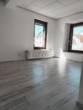 Das Wohnzimmer im Erdgeschoss - Ihr Zuhause im Südharz – innen bereits modernisiert, außen Platz für Ihre Ideen