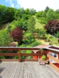 Ansicht von der Terrasse zum Garten - FACHWERKHAUS MIT SONNENTERRASSE UND SCHLOSSBLICK IN STOLBERG (HARZ)